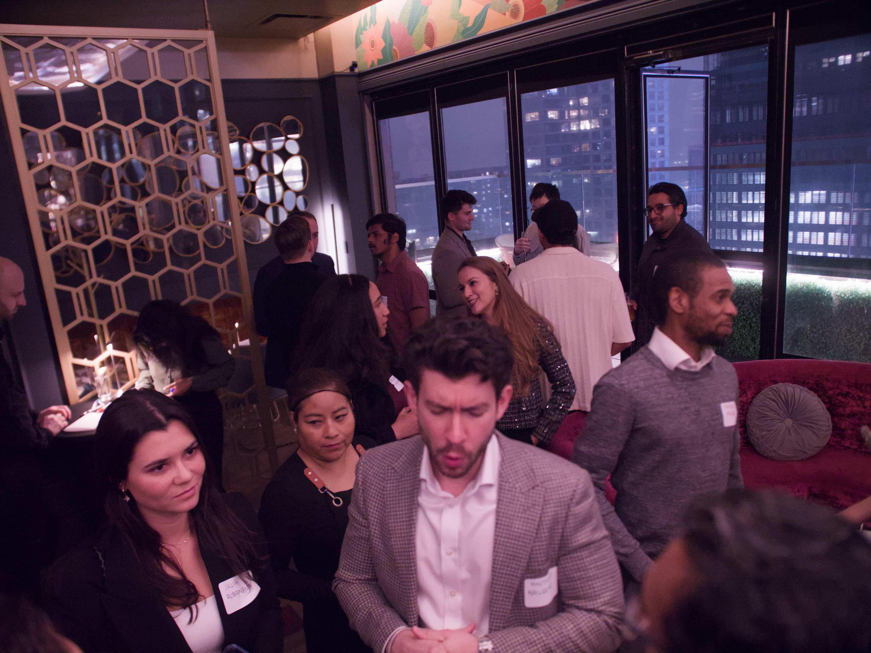 Guests at a Red Carpet Room mixer